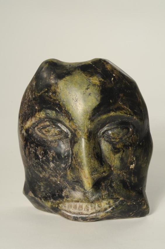carved stone mask