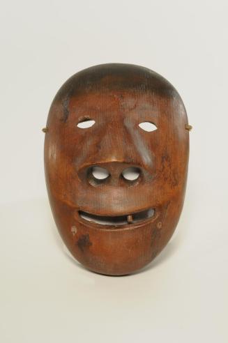 carved wooden mask from St. Lawrence Island, Alaska