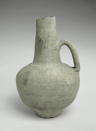 Incised clay pitcher