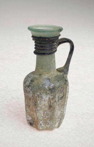 Glass jug with trailed decoration around the neck